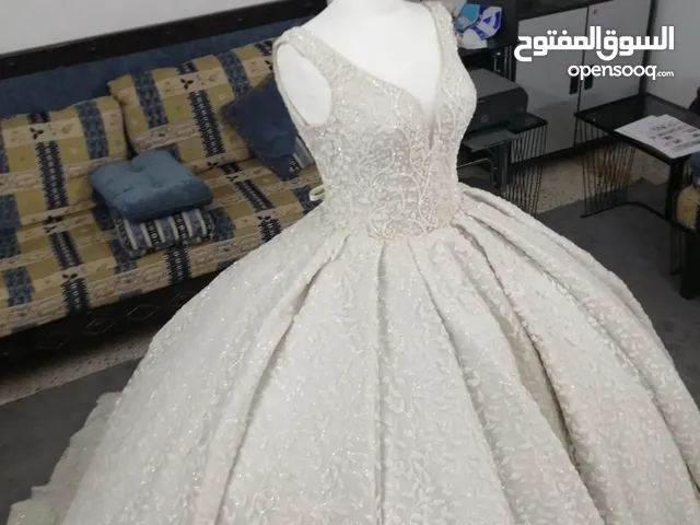 فساتين زفة عروس للبيع أو للإيجار مقاس سمول وإكس سمول