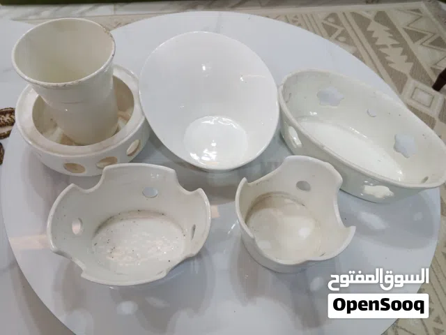 صحون فخار اللون ابيض