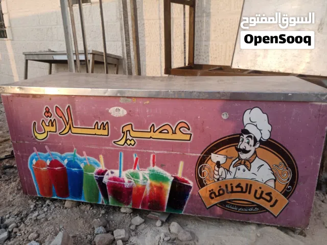 طاولات وحوض مجلى للمطاعم والمحلات وطفايه حريق وكباسه زيتون او فستق حلبي للحلويات ومناصب رفوف حديد