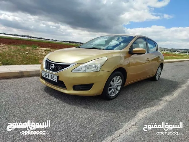 نيسان تيدا 2014 لون ذهبي  2 جيد بسعر مغري كاش واقصاط