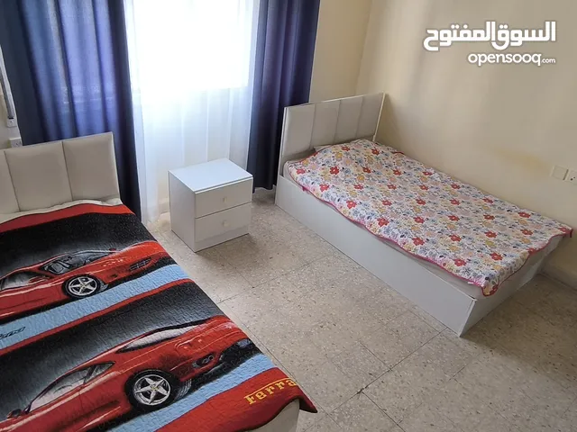 Children's bedroom: beds, wardrobe and chest of drawers