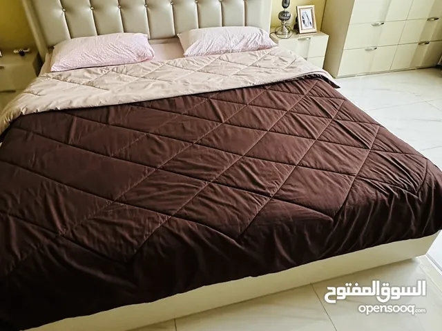 King size Bed from home center used  with new medical matress 180x210 only in OMR 100