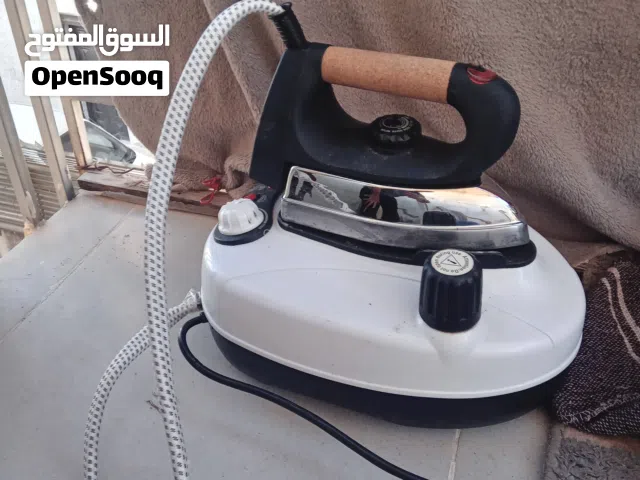 مكوى بخار مع قاعدة tiDA