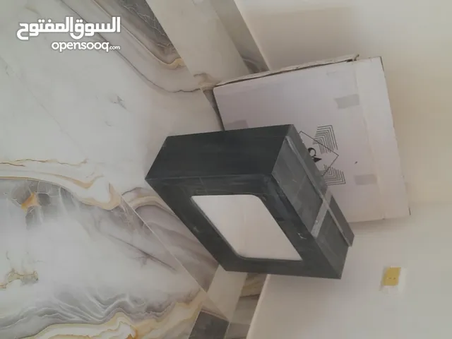 مغسلة بورسلان مع رف