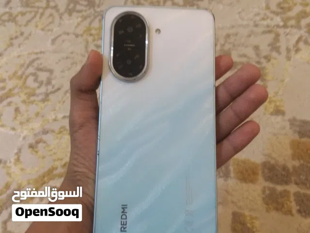 Redmi A5        تبديل بي ايفون