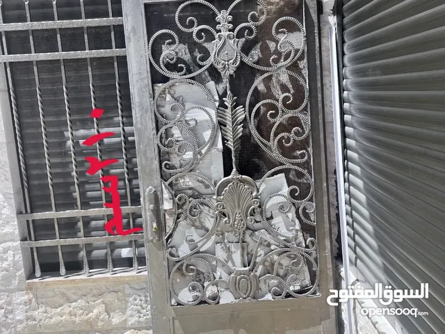 ابواب حديد ثقيله و بزجاج مسلكنه
