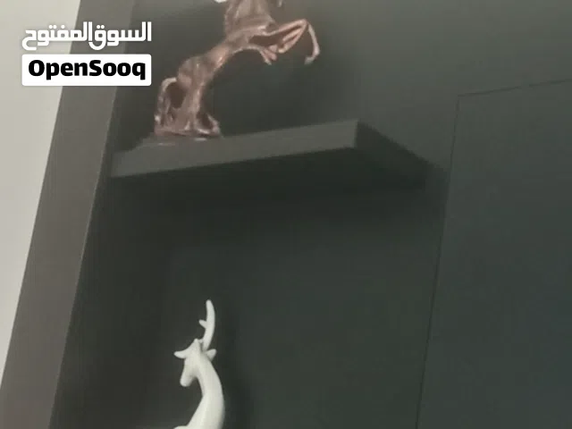 مجسم أحصنة وغزلان