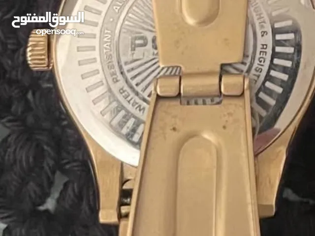 ساعه بوليس لون ذهبي استعمال بسيط الحاله شبه جديده للنساء