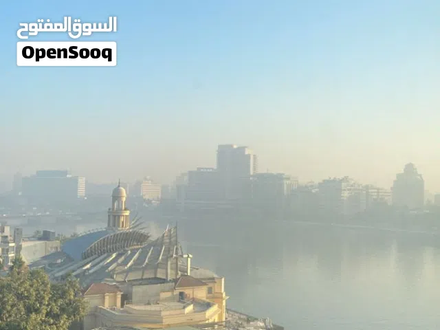 وحـدتــك الفـنــدقـــية بــ إطــلالـــة عـلــى الـنــيـــل والأهـرامــات