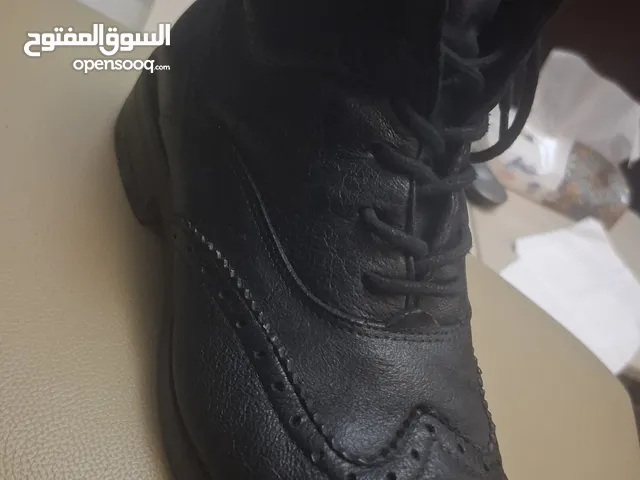 Black Boots in Amman