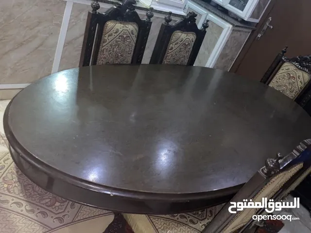 طاولة سفرة شكل بيضاوي 6 مقاعد