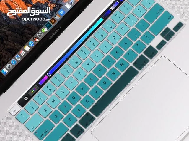 واقي لحماية لوحة مفاتيح ابل بالوان مختلفه لكافة انواع لاب توبات ابل انجليزي و عربي