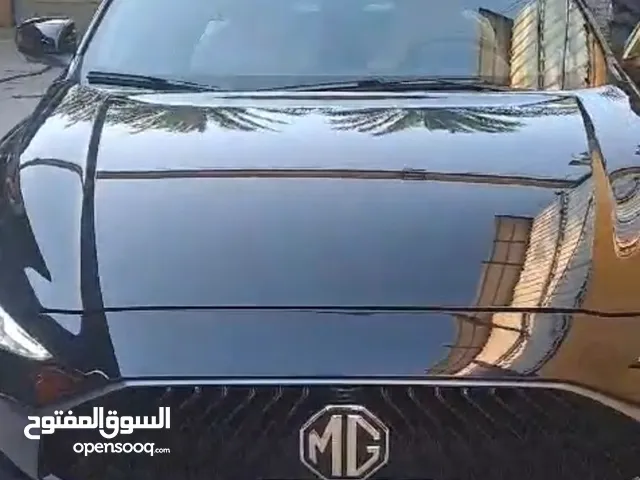 سياره MG GT 1500 توربو لون اسود موديل 2022 جديده ماشيه 10 الاف كم خاليه من الصبغ والبارد رقم بغداد