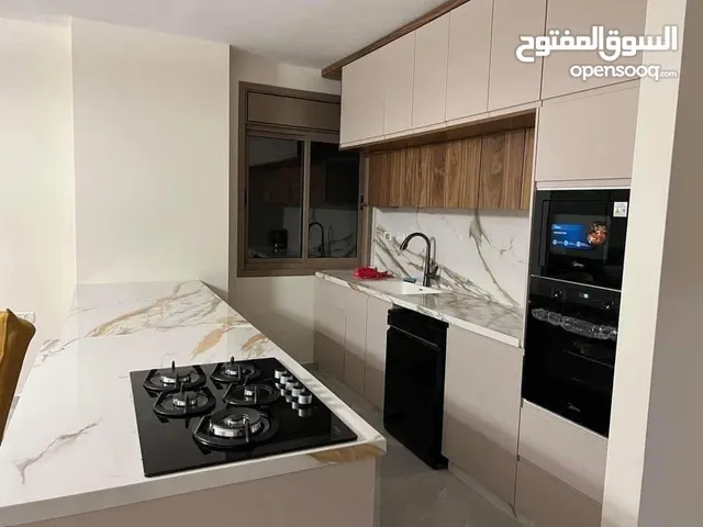 شقه فارغة للايجار في عبن منجد قرب سوبرماركت بغداد لم تسكن من قبل