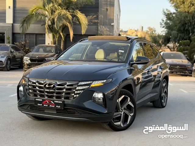 هونداي توسان ترخيص 2022 محرك 1600 هايبرد plug in/يقطع على الشحنه 65 كيلو متر  271 حصان