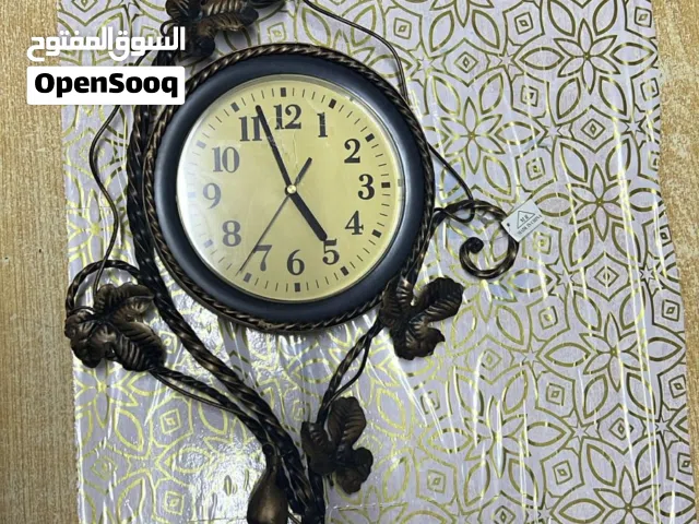 ساعة حائط تعليق لون برونزي