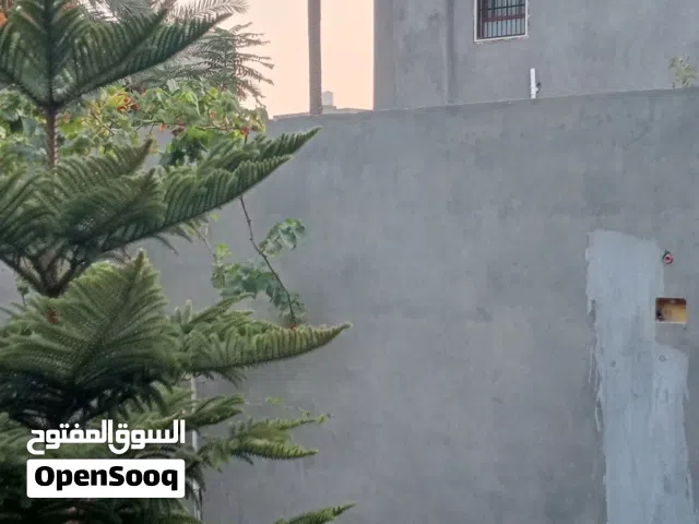 قطعة ارض عليها منزل ربط