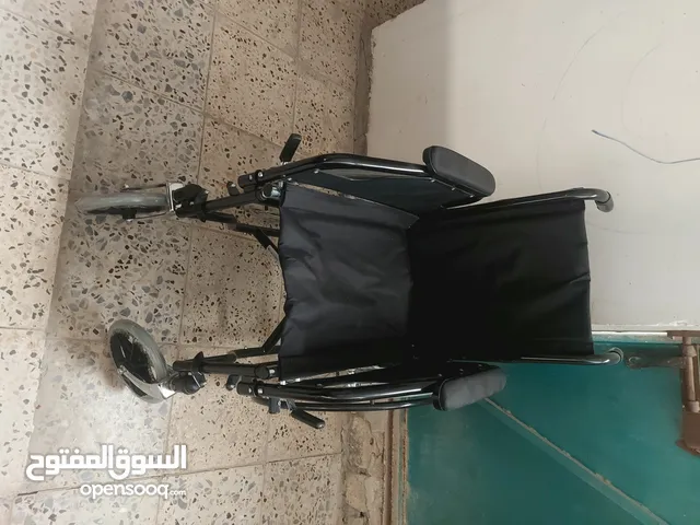 عربه دفع اطفال معاقين جديده