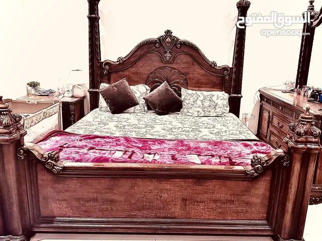 Full bedroom, King size bed, two side tables, 6-door cupboard and dressing table