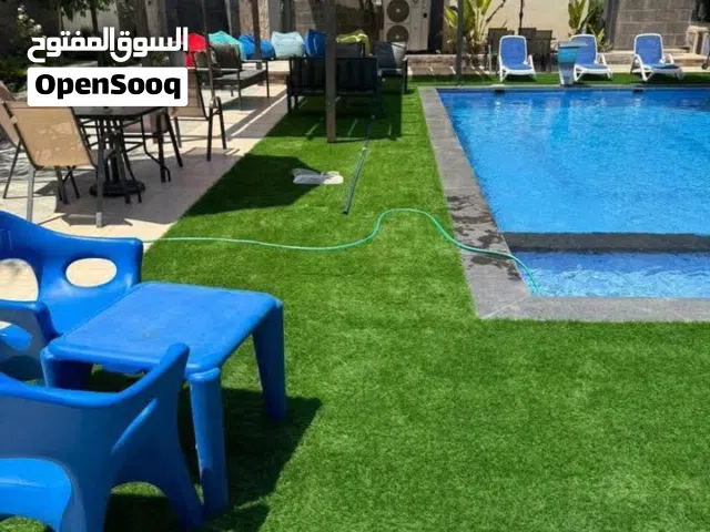 عشب صناعي صنع فيتنام فيتنامي  السعر لا يشمل التركيب ولا أجور التوصيل  اصنع أفخم واجهة لبيت
