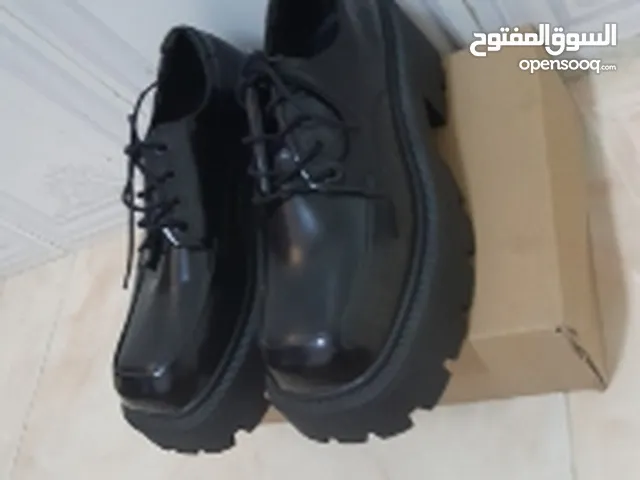 Black Boots in Sharjah