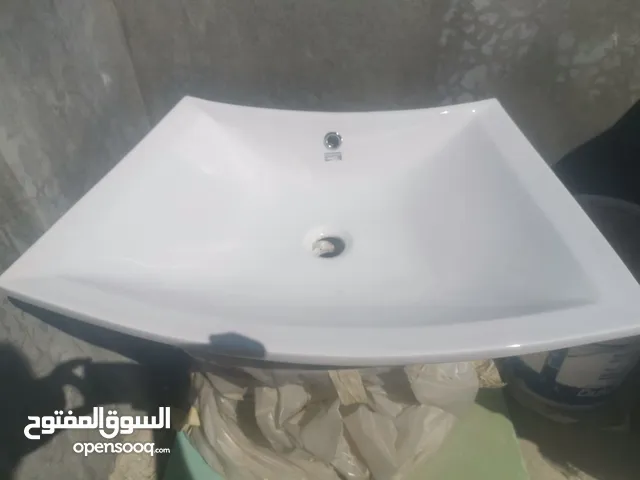 مغسلتين و خزانه