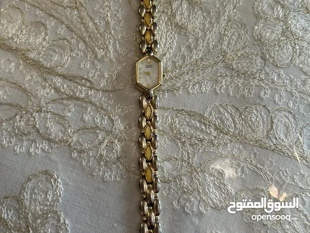 ساعة مرصعة بالصدف الاصلي