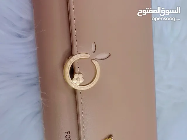 محفظة نسائية ماركة فوريفر يونج بشعار خنجر براند نورمجان