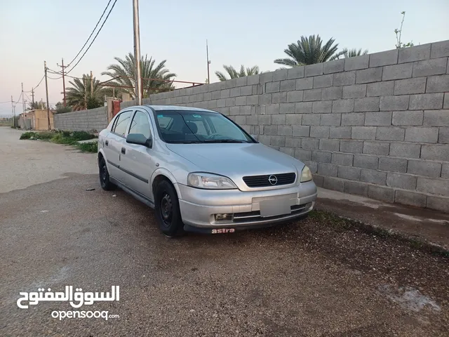 اوبل استرا صدامي 2002 وارد ياباني رقم بغداد انكليزي باسمي تحويل مباشر
