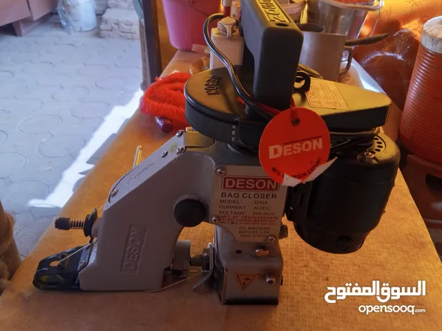 معدات التعبئة والتغليف التجاريةآلة إغلاق الأكياس ماكينة خياطة محمولة لإغلاق الأكياس بغرزة واحدة --
