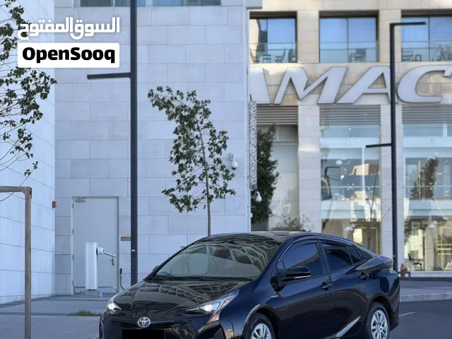 تويوتا بريوس 2017 لون اسود مميزه فحص كامل كرت ابيض 7 جيد ممشى قليل