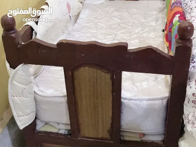 سرير طفل مع عربانة
