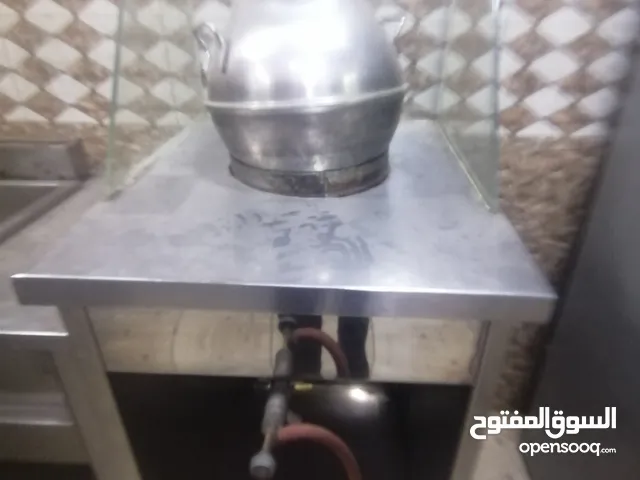طاولة غاز لجرة الفول مع الجرة