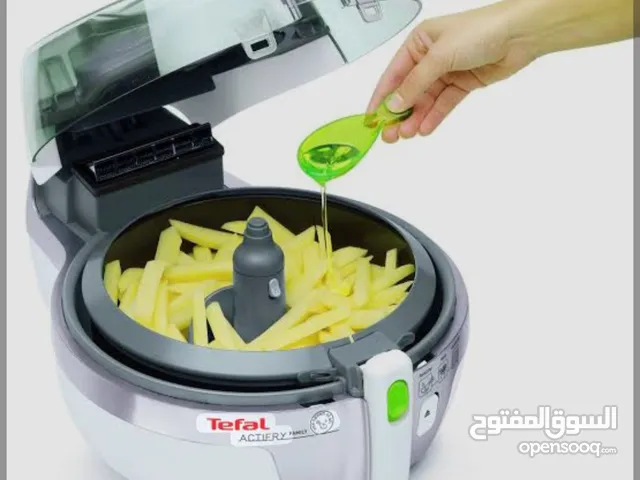 قلاية تيفال بدون زيت 1 kg بقوة 1400w شبه جديده