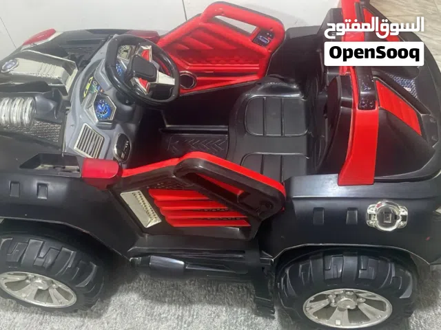سيارة أطفال كبيرة لون اسود واحمر معها شاحنها بس فيها مشكلة بالبطارية سعرها جديد 150 بدي أبيعها 25