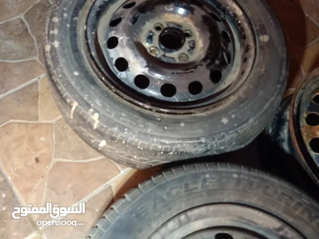 جنط لانسر حديد 14 برغي بعيد عدد 3