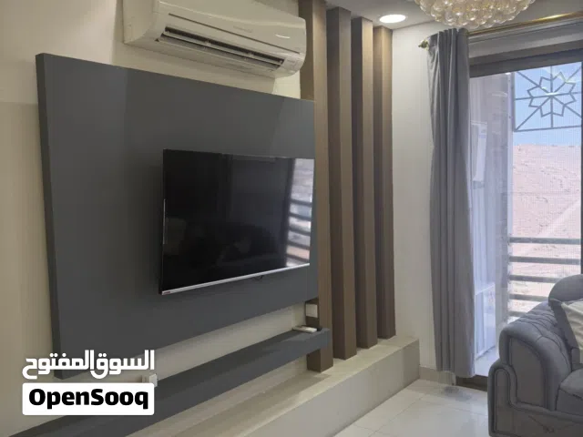 Two bedrooms and a living room + maid’s room with attached bathroom + balcony