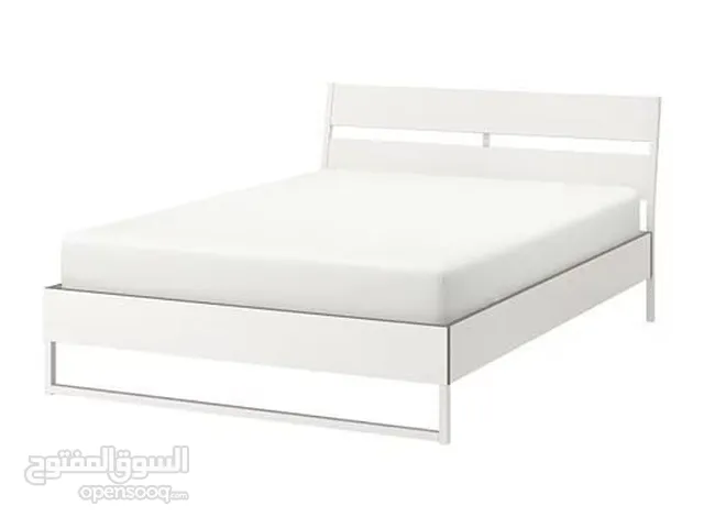 Modern double bed with mattress in excellent condition