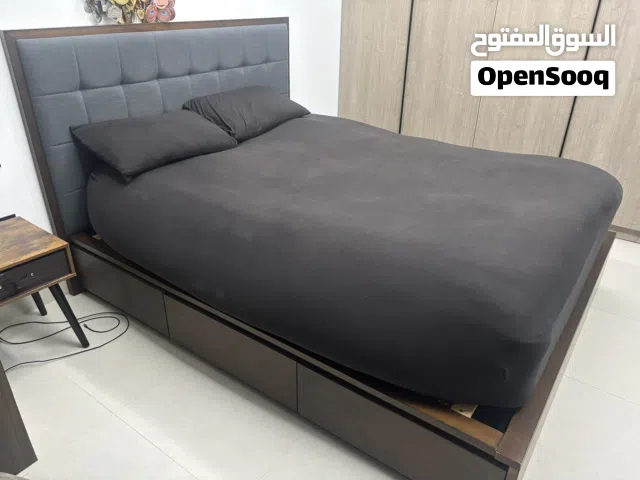 Dark oak wood bed frame