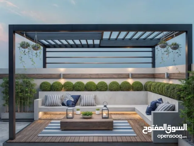 تصميم وتنفيذ لاندسكيب وديكورات خارجيه حديثه وجلسات خارجيه حديثه وشلالات مائيه مودرن ونوافير مودرن