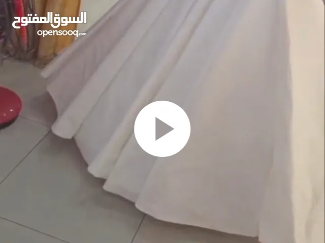 فستان عروس أبيض