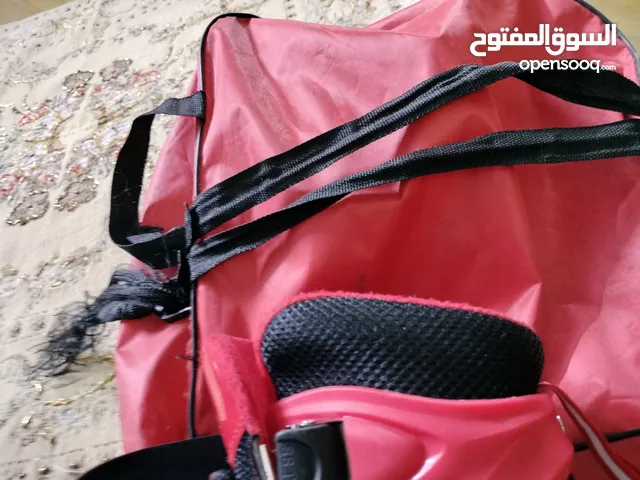 باتيناج اطفال احمر ف اسود بشنطته مستعمل ينفع اولادي وبناتي