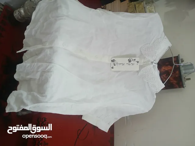قميص ابيض بياخه كبير نصف ردن قماش راقي مخرم