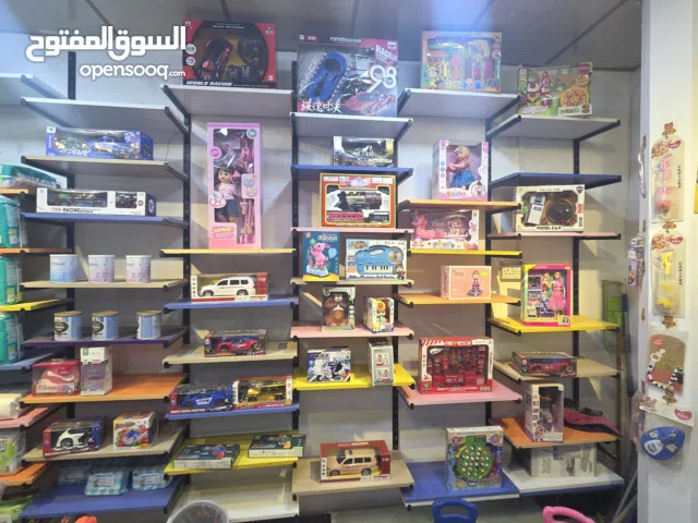 تعزيلة محل اطفال فيه حفاظات ورضاعات والعاب وفوف تركية وسبلت