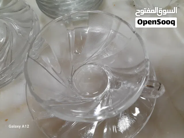 طقم كاسات مع اطباق