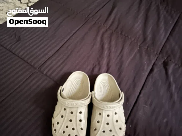 Brown crocs
