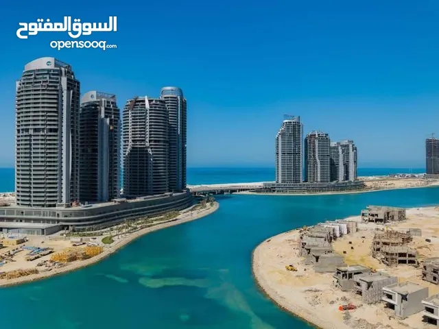 * بأجمالى سعر 3 مليون 300 شاليه للبيع امام ابراج العلمين مباشرة بتقسيط 10 سنين ( مقدم 165 ألف )