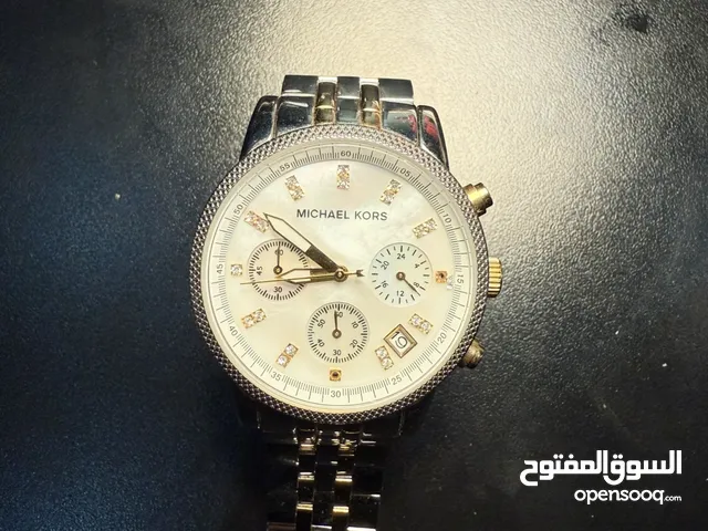 ساعه مايكل كورس اصليه مش مستعمله حتى استعمال واحد