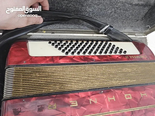 Accordion for sale.