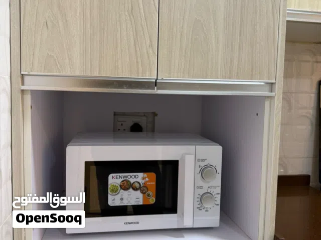 Two bedrooms and a living room + maid’s room with attached bathroom + balcony